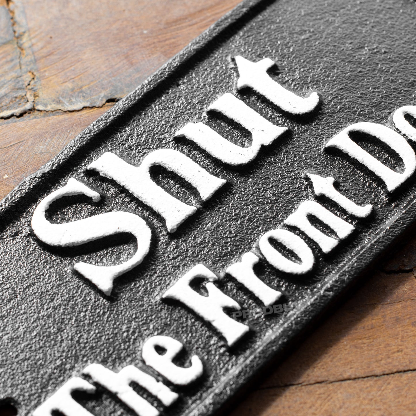 Cast Iron 'Shut The Front Door' Garden Wall Sign