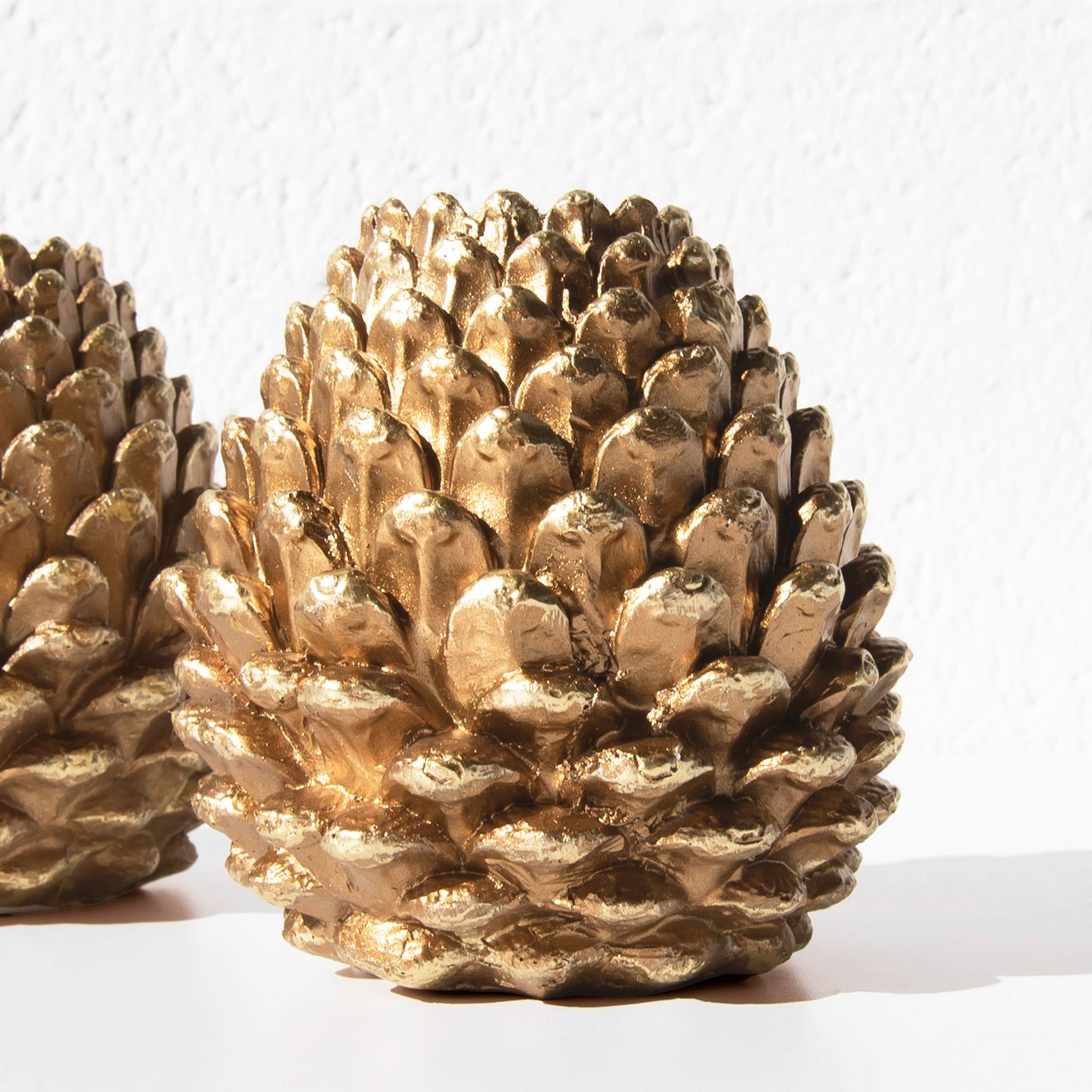 Set of 2 Gold Resin 10cm Pinecone Shaped Candlesticks