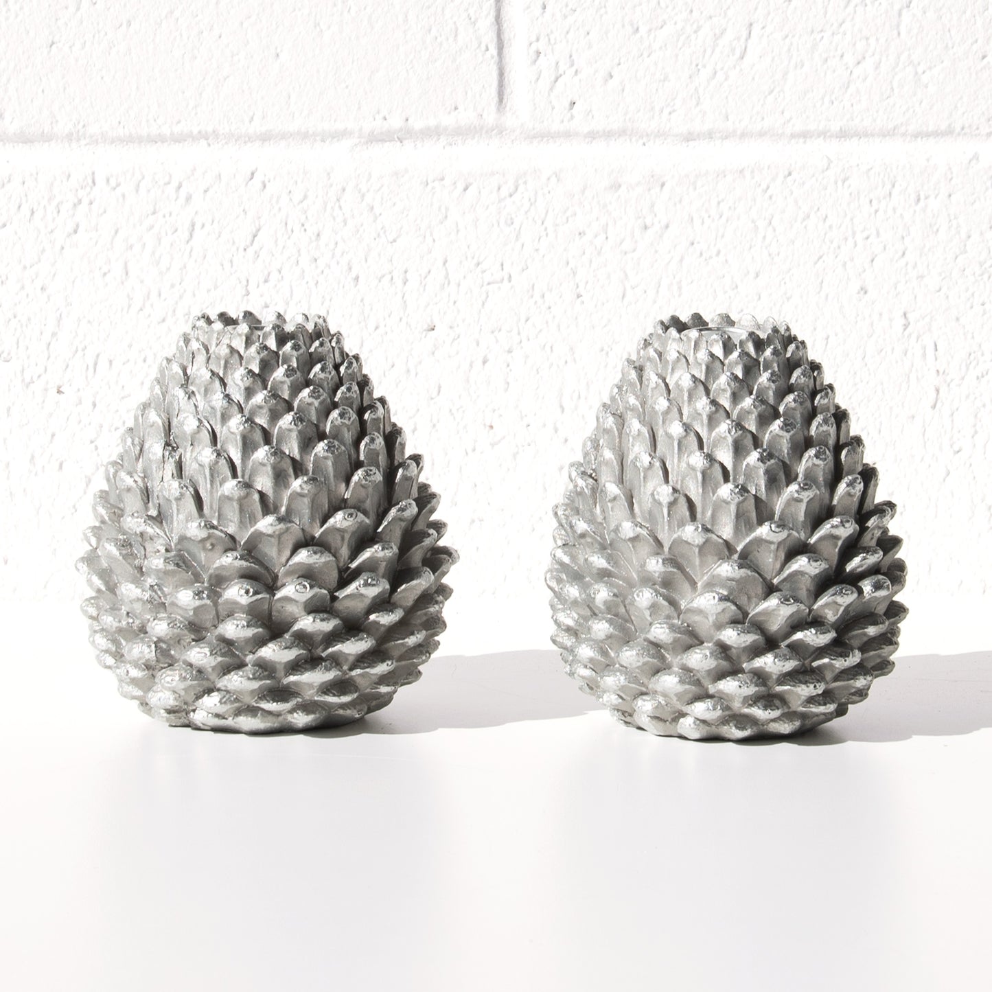 Set of 2 Silver Resin Pinecone Shaped Candlesticks