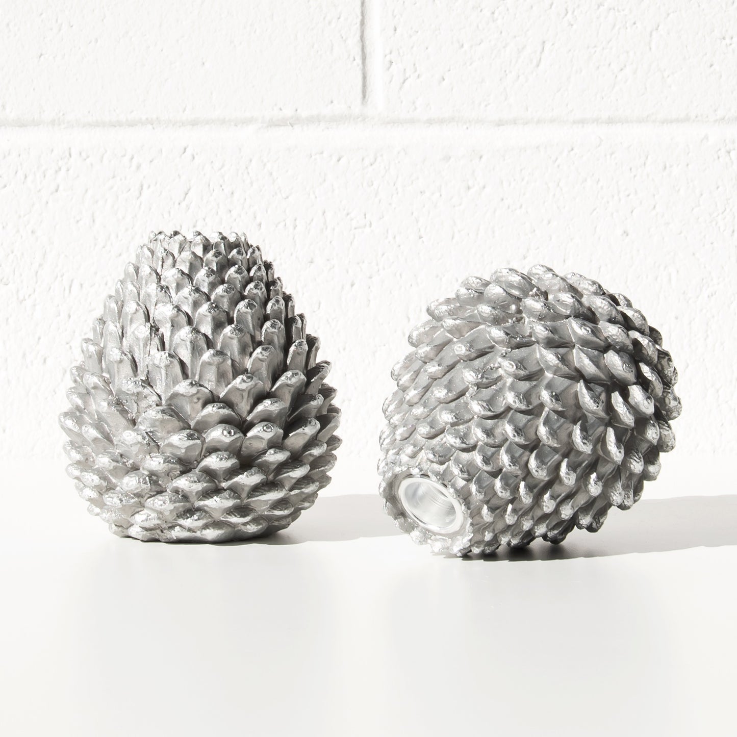 Set of 2 Silver Resin Pinecone Shaped Candlesticks