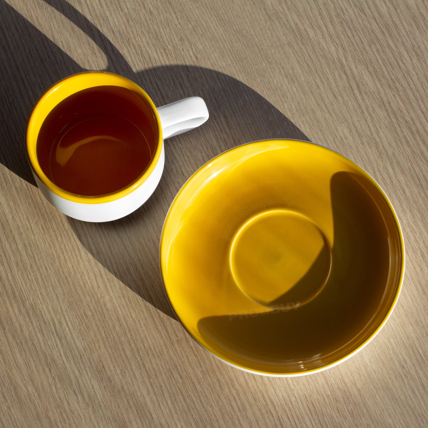 Yellow & White La Cafetière Tea Cup & Saucer Set