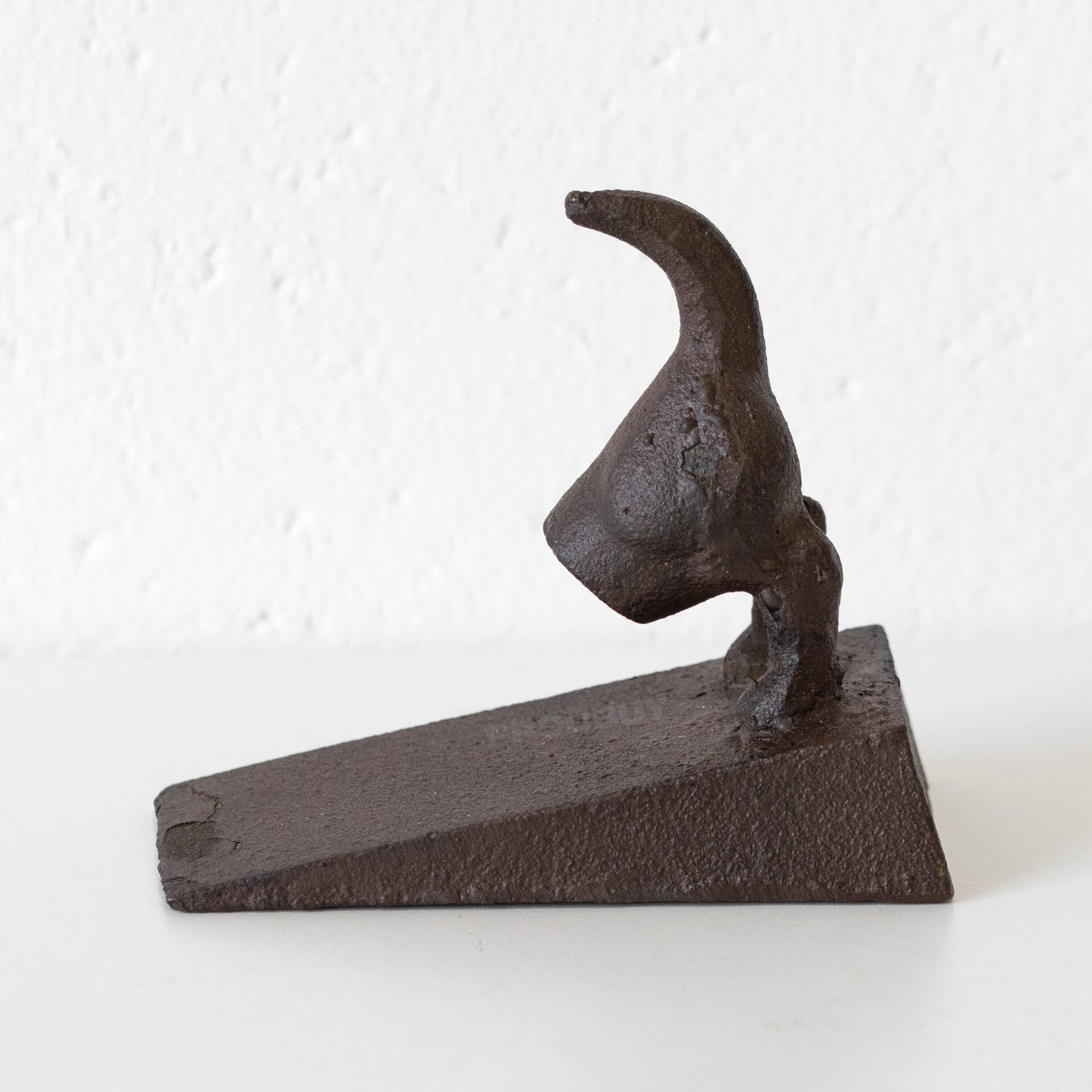 Cast Iron Dog Tail Door Stop Wedge