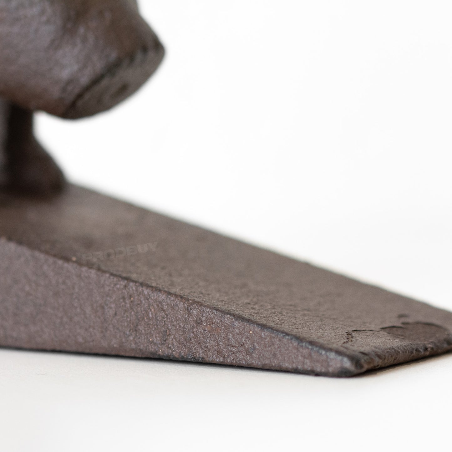 Cast Iron Dog Tail Door Stop Wedge