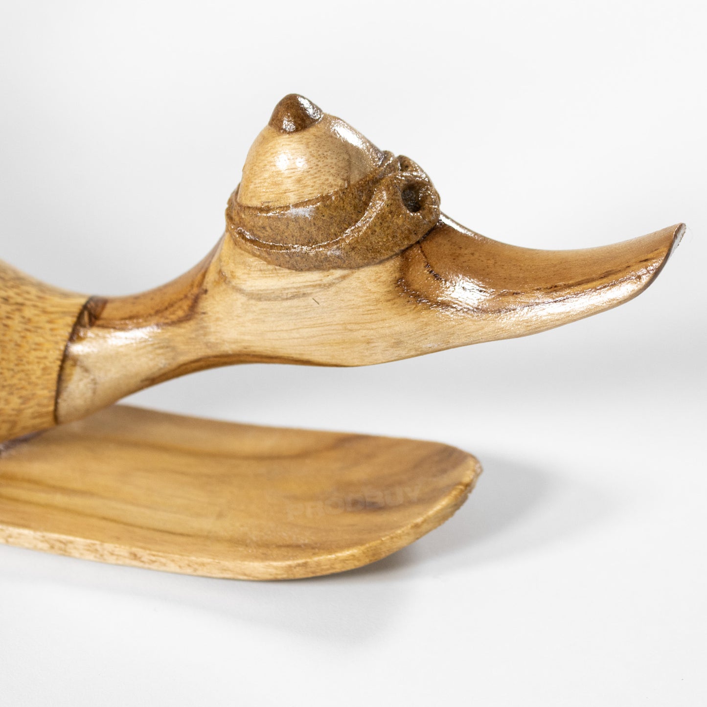 Teak Wood Duck on Snowboard Sculpture