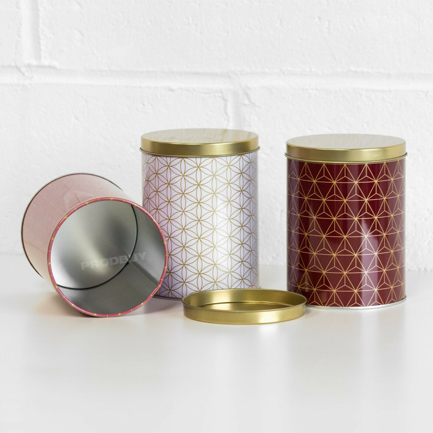 Set of 3 Geometric Storage Canisters Tea Coffee Sugar Red White Gold
