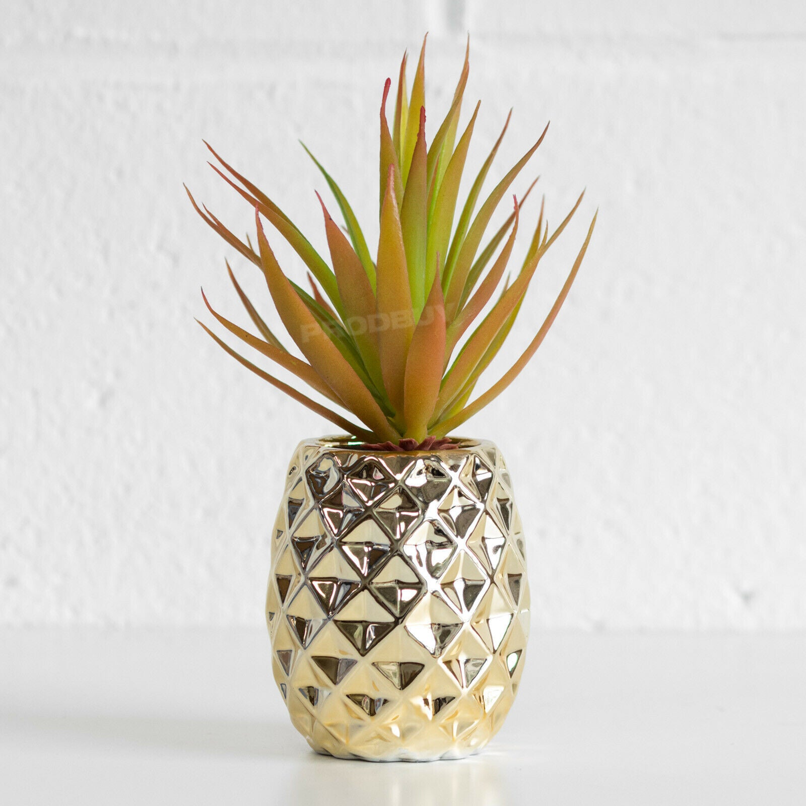 gold pineapple plant pot Artificial Succulent Plant with Gold Pineapple Shaped Pot – Robert David Home