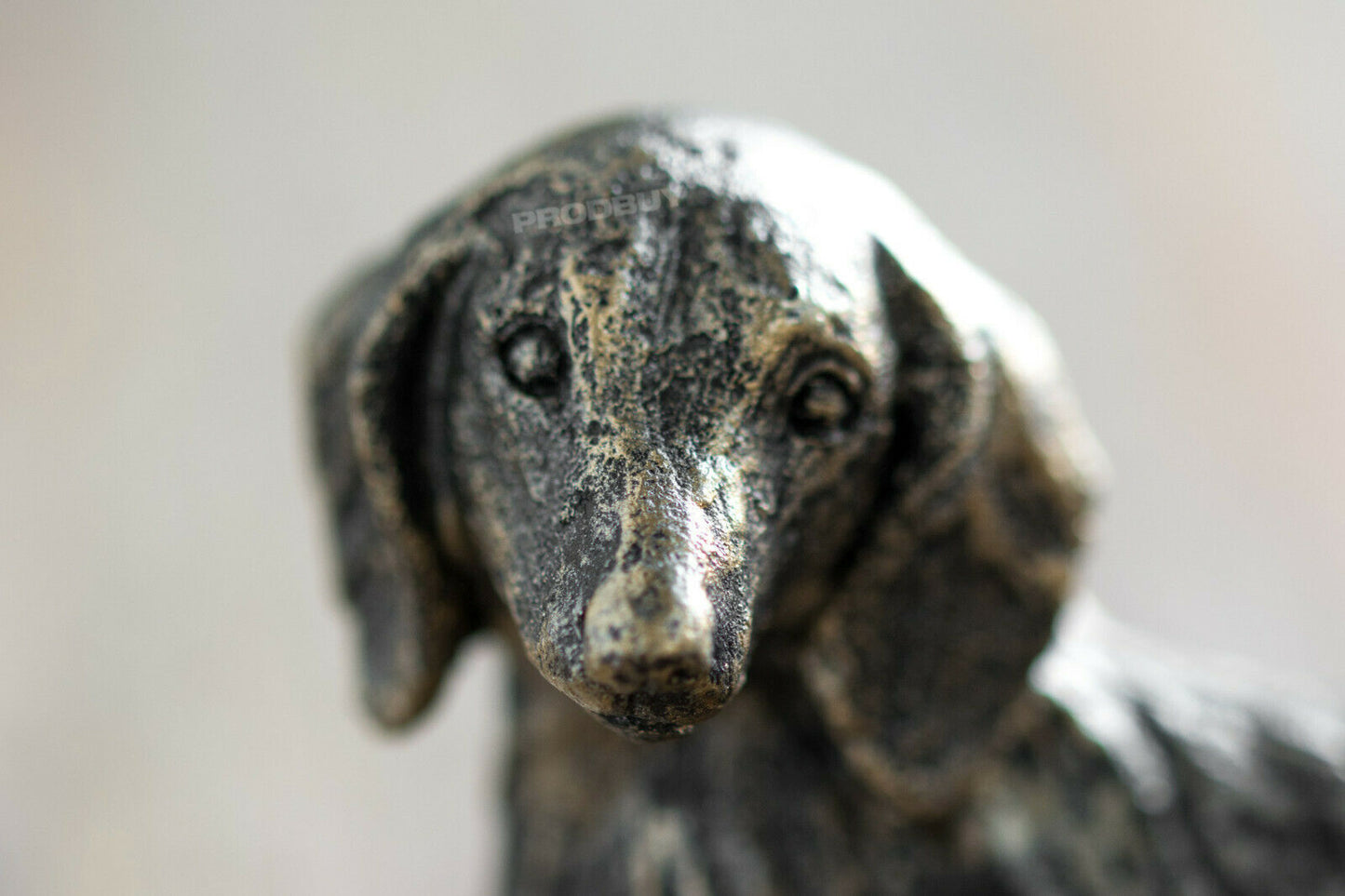 Small 7cm Sitting Dachshund Ornament Aged Bronze Appearance