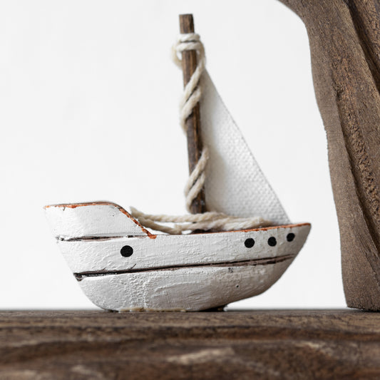 Rustic Wooden Brown & White Sailing Boat In Cove