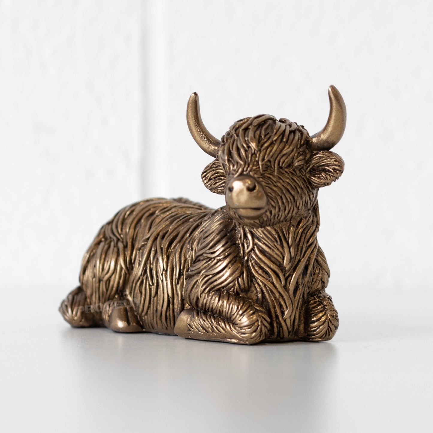 Sitting Highland Cow Bronze Resin Ornament 12.5cm