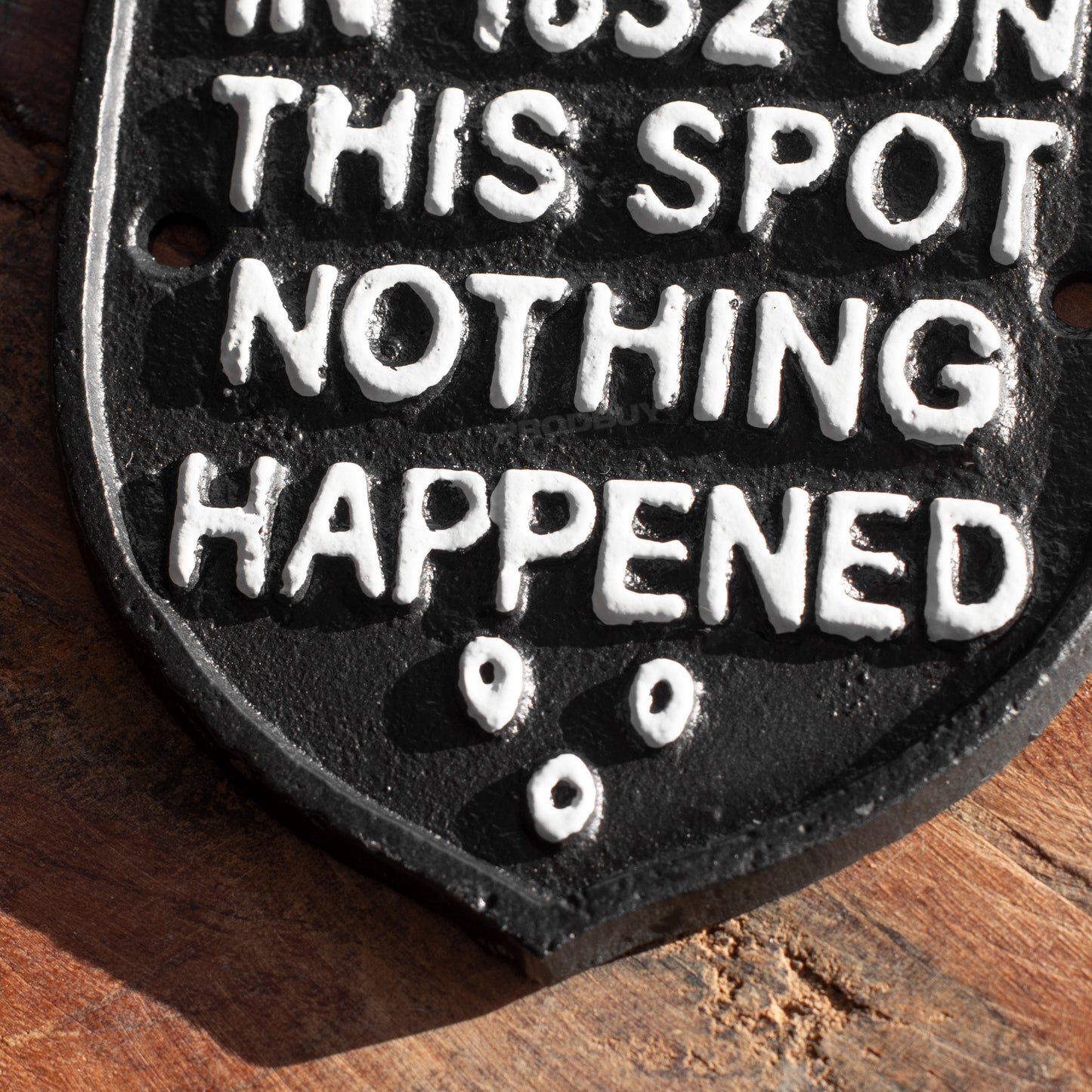 Cast Iron 'On This Spot Nothing Happened' Wall Sign