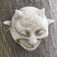 Small Heavy Stone Imp Face Wall Ornament
