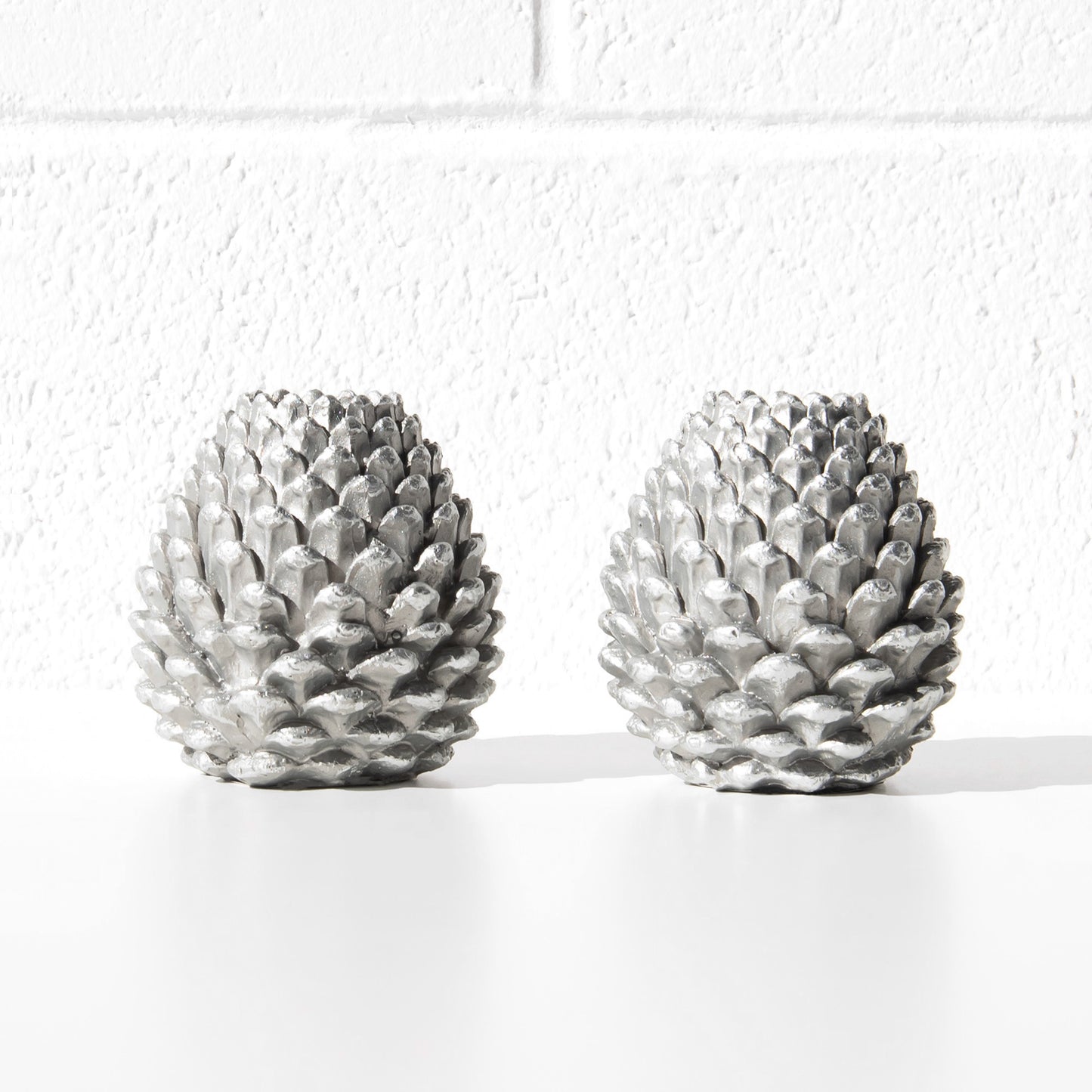 Set of 2 Silver Resin 10cm Pinecone Shaped Candlesticks