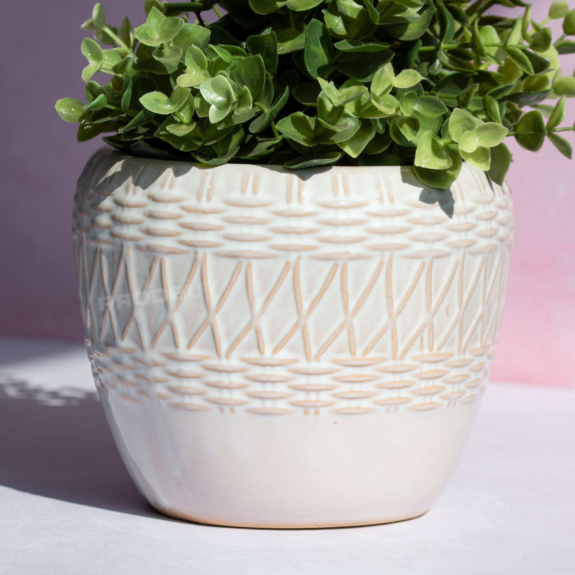 13cm plant pot Small 13cm Plant Pot with Embossed Rounded Woven Ceramic Design – Robert David Home