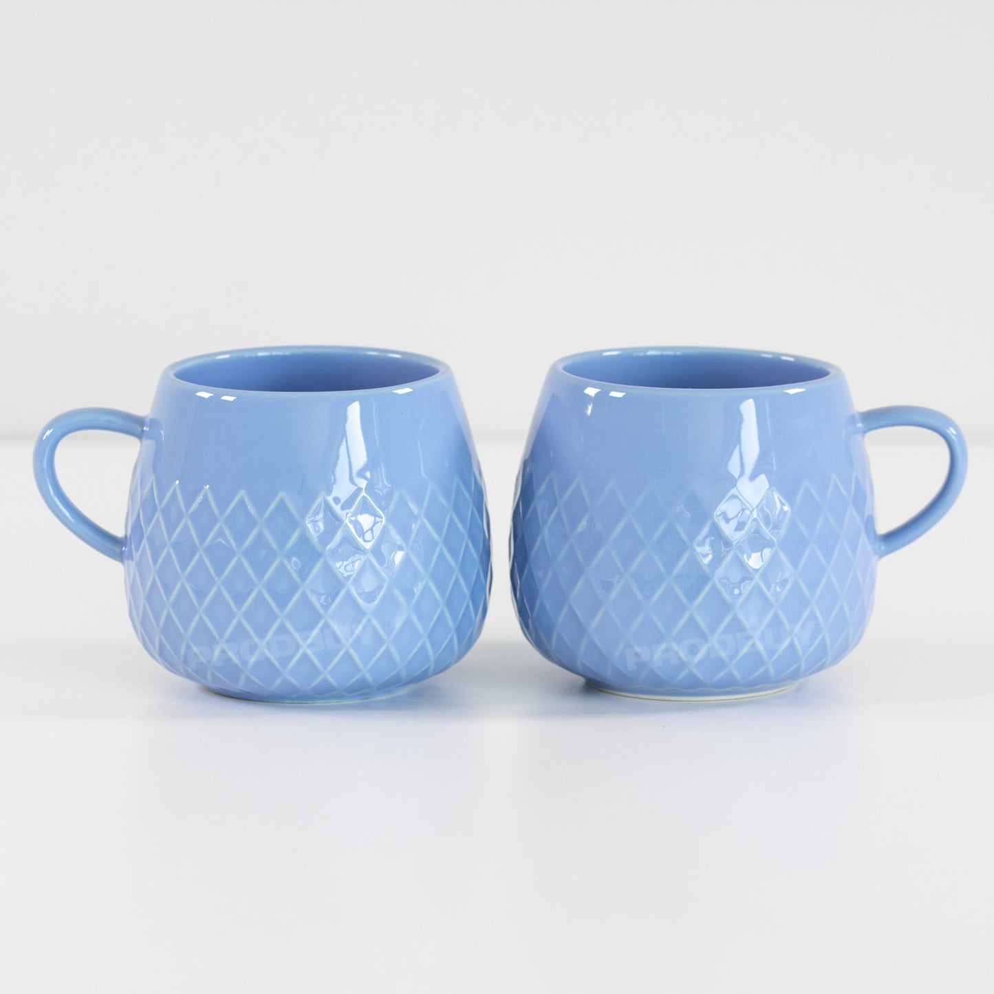 Set of 2 Blue Embossed Glazed Coffee Mugs
