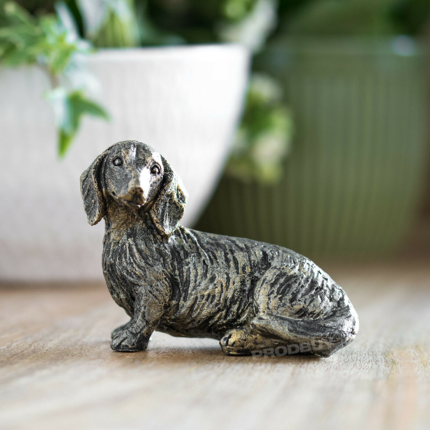 Small 7cm Sitting Dachshund Ornament Aged Bronze Appearance