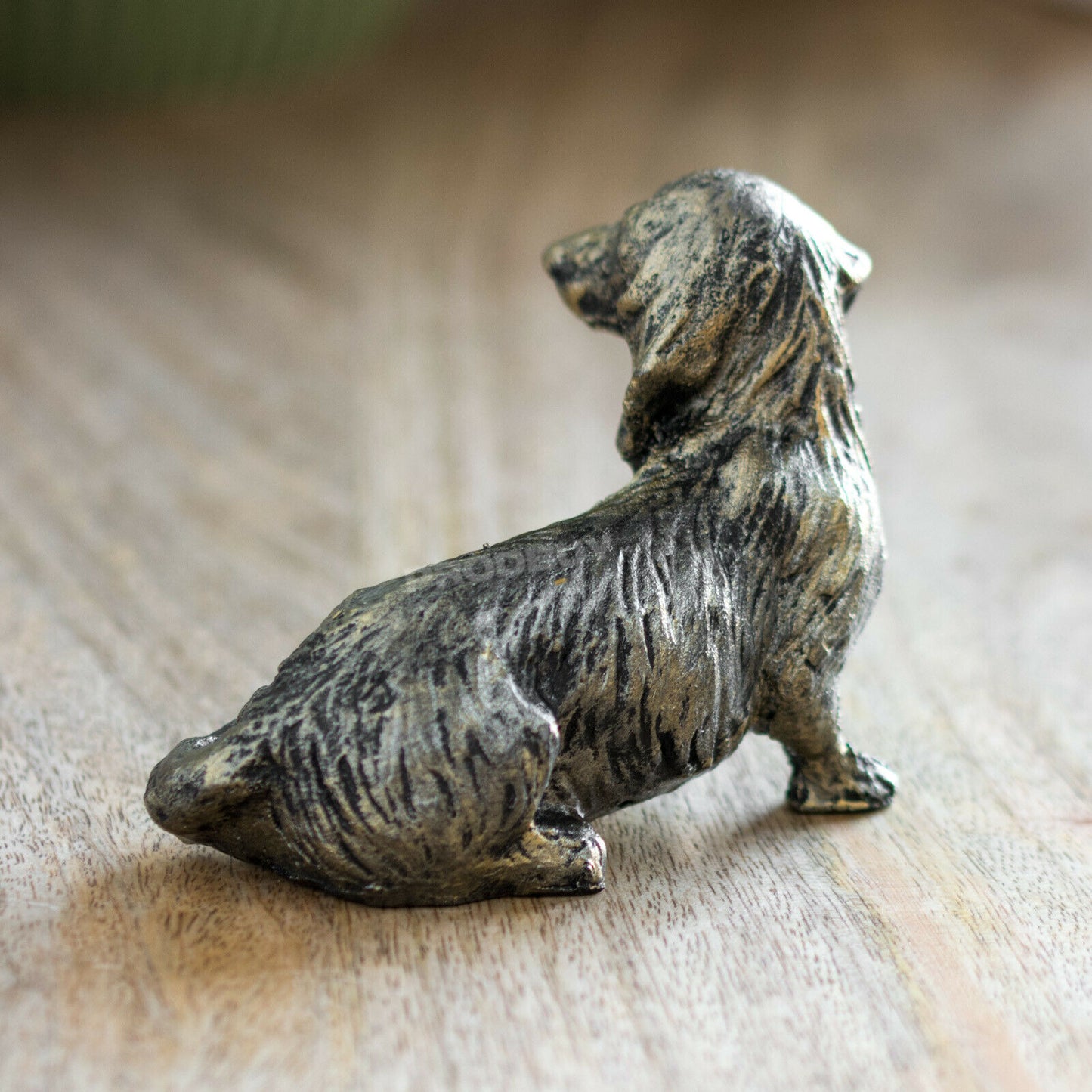 Small 7cm Sitting Dachshund Ornament Aged Bronze Appearance