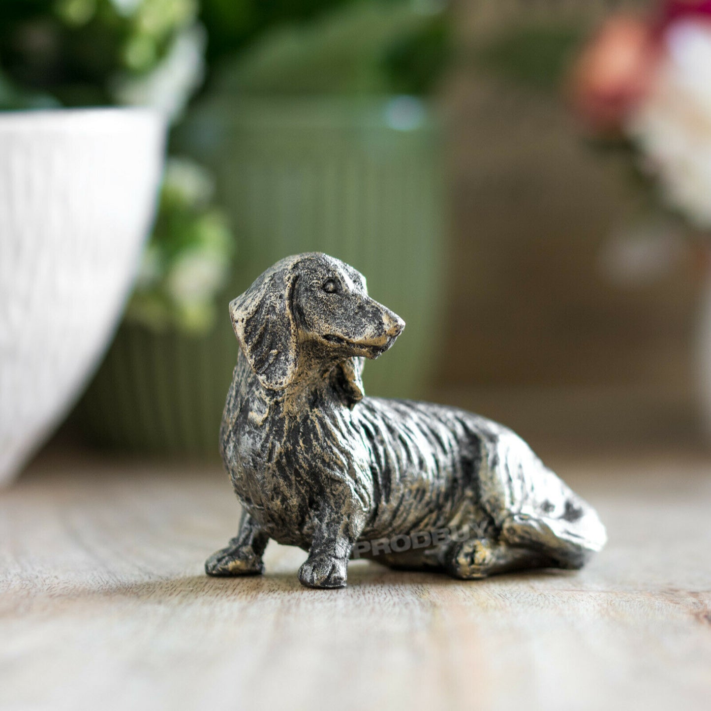 Small 7cm Sitting Dachshund Ornament Aged Bronze Appearance